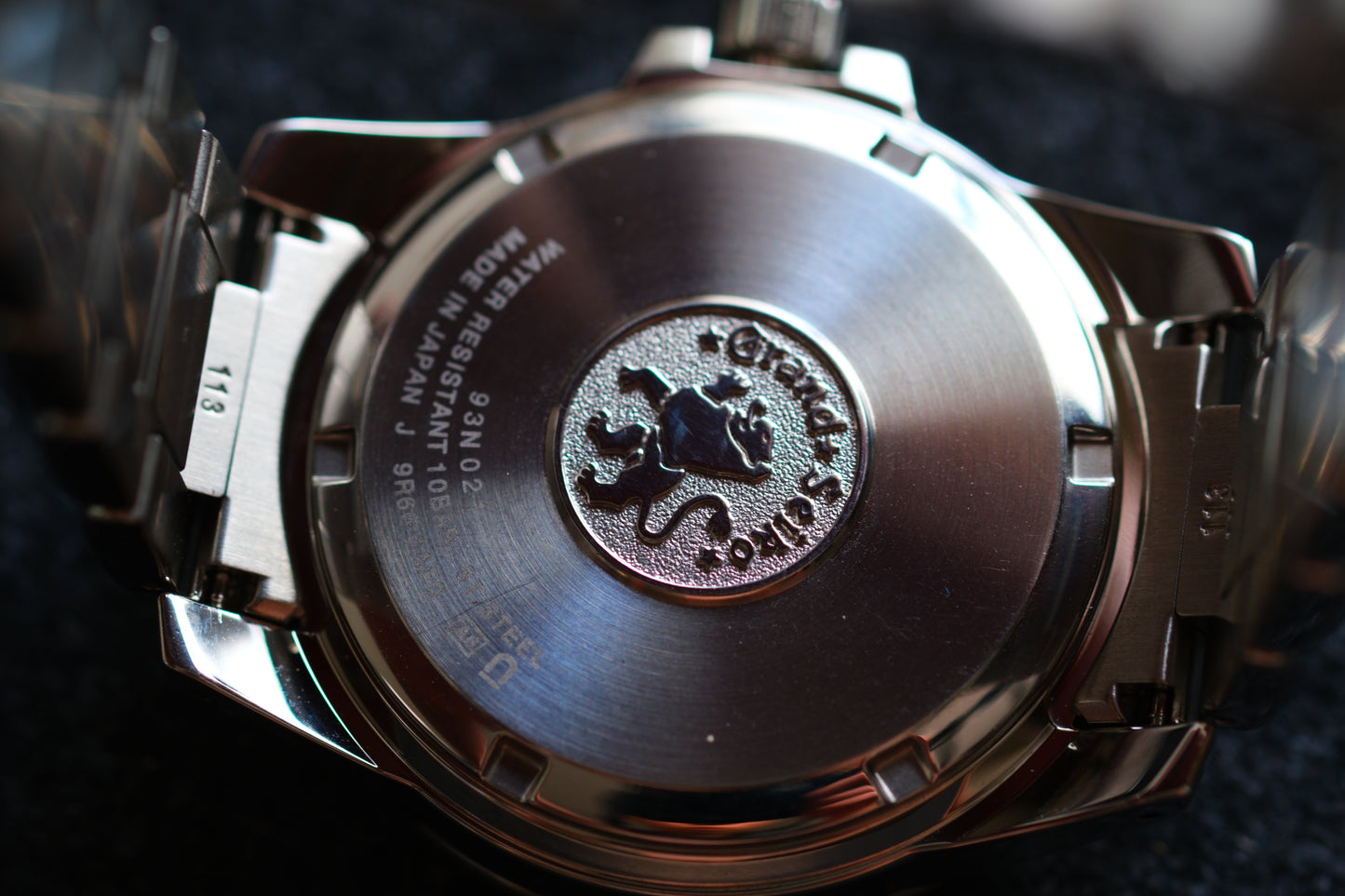 Grand Seiko SBGE213 9R66-0AE0 Spring Drive GMT Red Hands Black Dial Box Manual User Hang Tag Good Condition