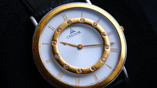 Credor 8N70-6070 Two Bezel 18K Gold Diamond Carson White Dial