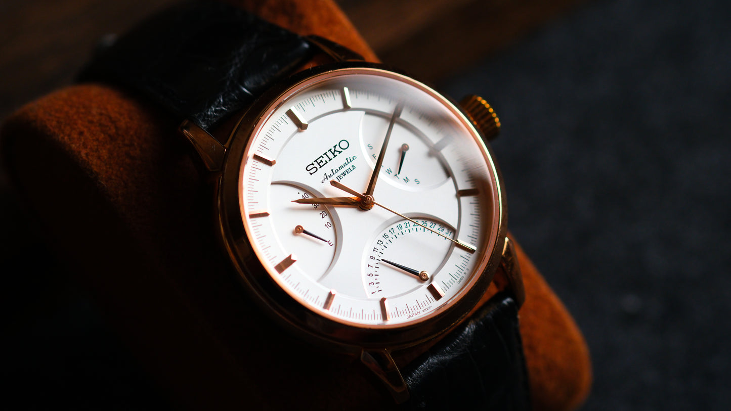 Seiko SARD006 Pressage 6R24-00D0 Rose Gold JDM Rare Retrograde day-date Power Reserve and a white dial | Great Condition