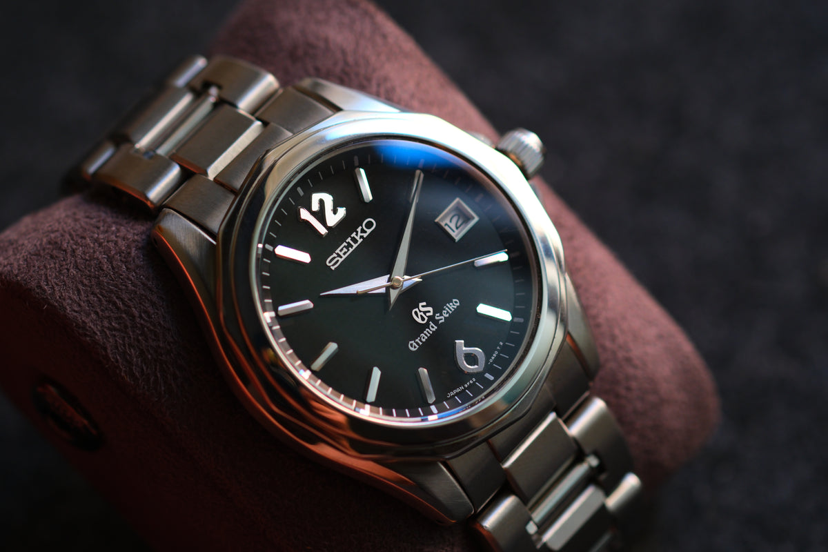 Grand Seiko SBGX035 9F62-0A60 HAQ 12-Sided Bezel Black Woven Dial Great Condition