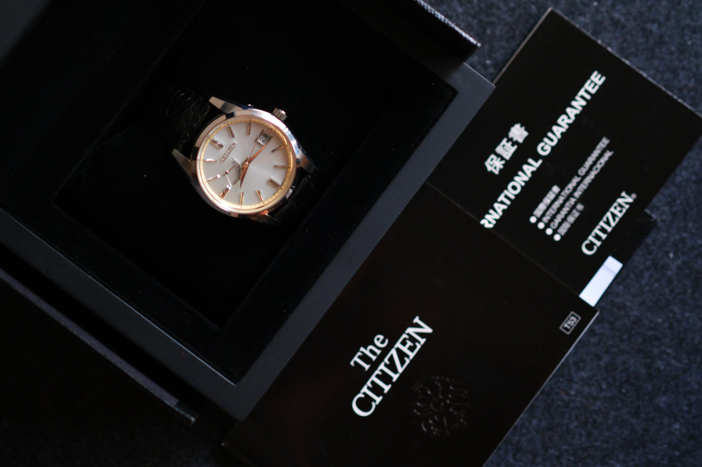 The Citizen AQ1010-03A/A010-T018530 Eco Drive Full Box Paper White Dial