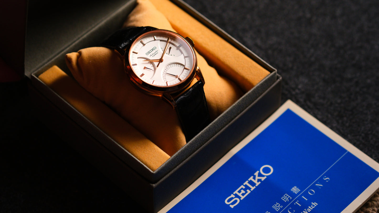 Seiko SARD006 Pressage 6R24-00D0 Rose Gold JDM Rare Retrograde day-date Power Reserve and a white dial | Great Condition
