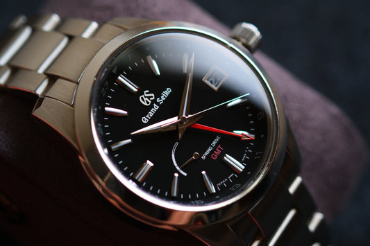 Grand Seiko SBGE213 9R66-0AE0 Spring Drive GMT Red Hands Black Dial Box Manual User Hang Tag Good Condition
