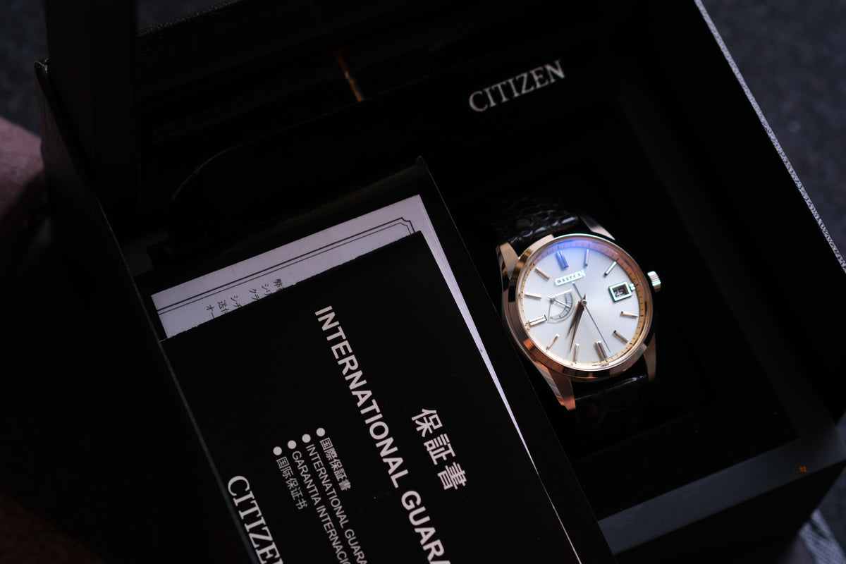 The Citizen AQ1010-03A A010-T018530 Eco Drive Full Box Paper White Ice Blue Dial