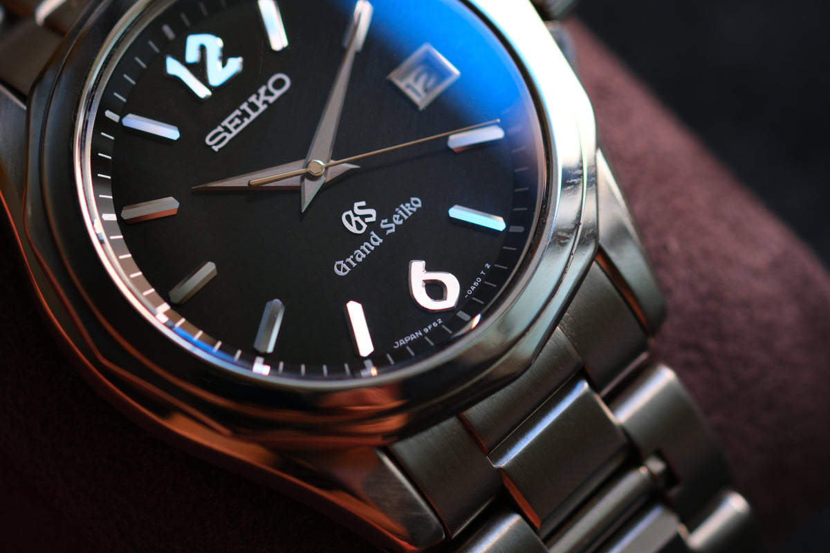 Grand Seiko SBGX035 9F62-0A60 HAQ 12-Sided Bezel Black Woven Dial Great Condition