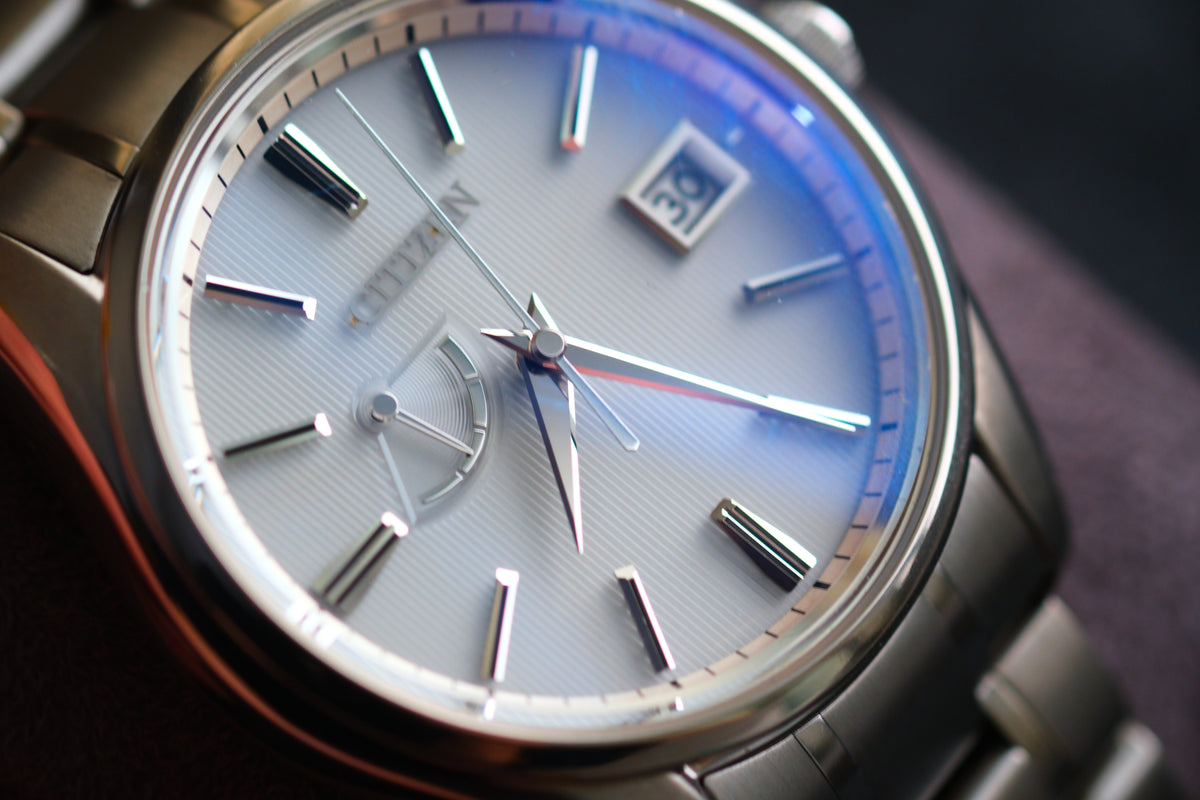 The Citizen Chronomaster AQ1020-51A Titanium Eco Drive Brushed-stripe White dial Box Manual User Excellent Condition
