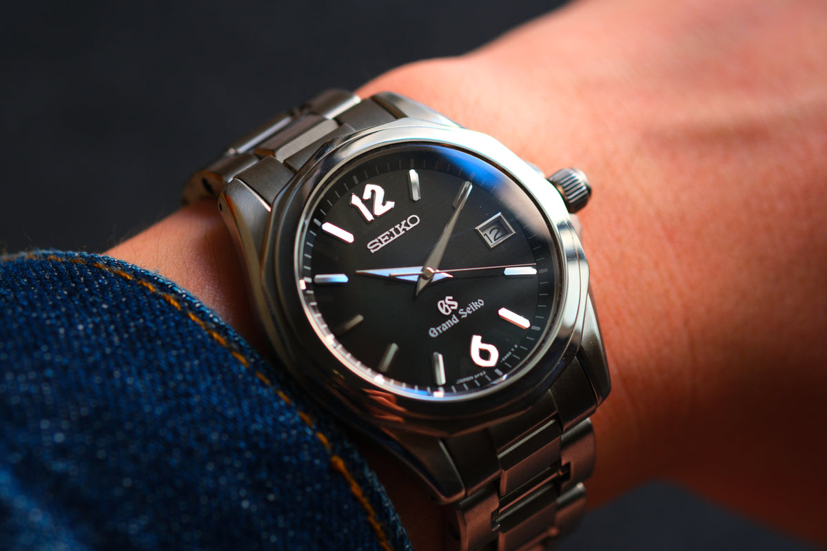 Grand Seiko SBGX035 9F62-0A60 HAQ 12-Sided Bezel Black Woven Dial Great Condition