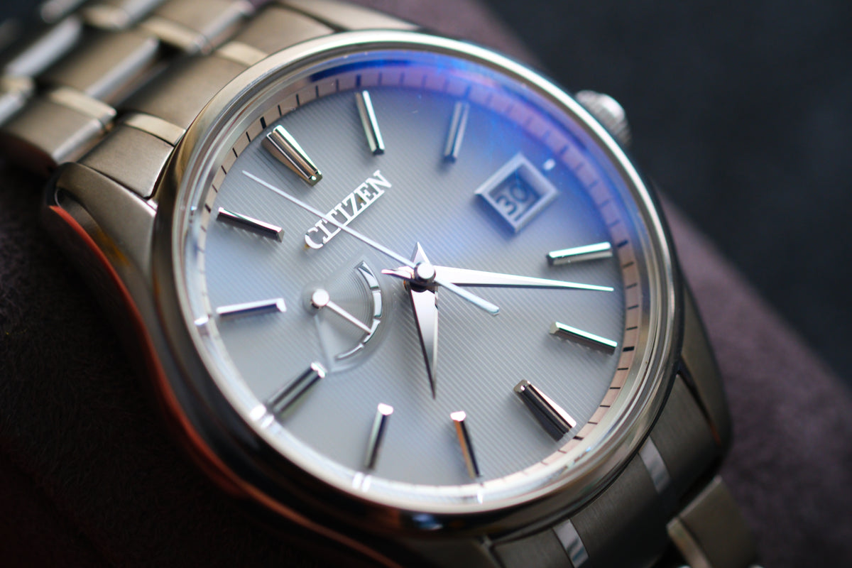 The Citizen Chronomaster AQ1020-51A Titanium Eco Drive Brushed-stripe White dial Box Manual User Excellent Condition
