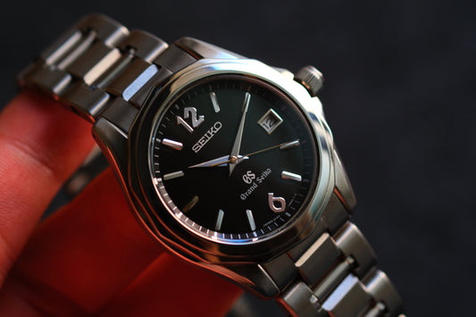 Grand Seiko SBGX035 9F62-0A60 HAQ 12-Sided Bezel Black Woven Dial Great Condition