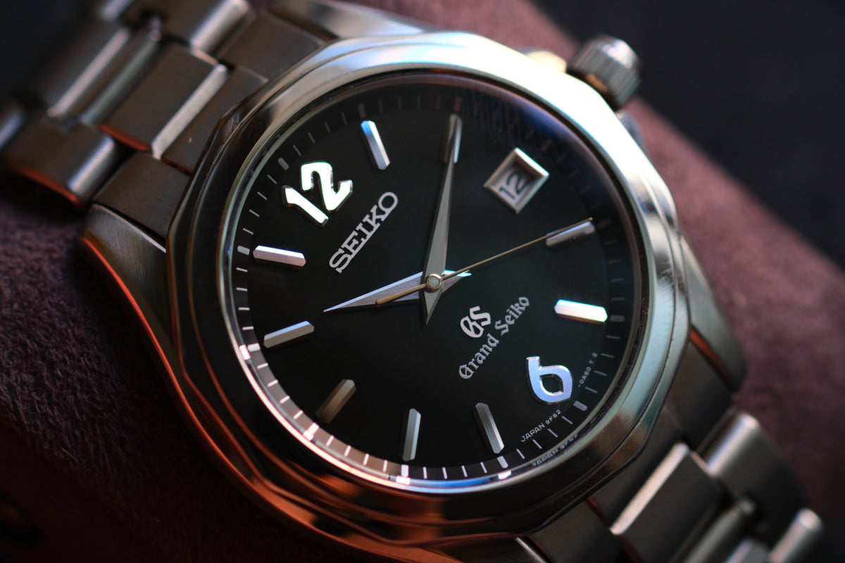 Grand Seiko SBGX035 9F62-0A60 HAQ 12-Sided Bezel Black Woven Dial Great Condition