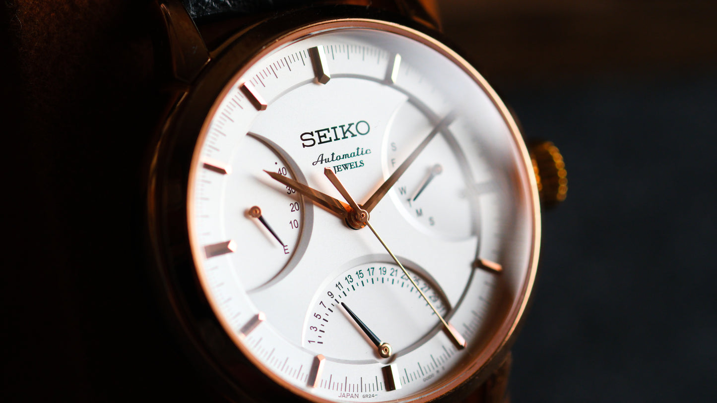 Seiko SARD006 Pressage 6R24-00D0 Rose Gold JDM Rare Retrograde day-date Power Reserve and a white dial | Great Condition