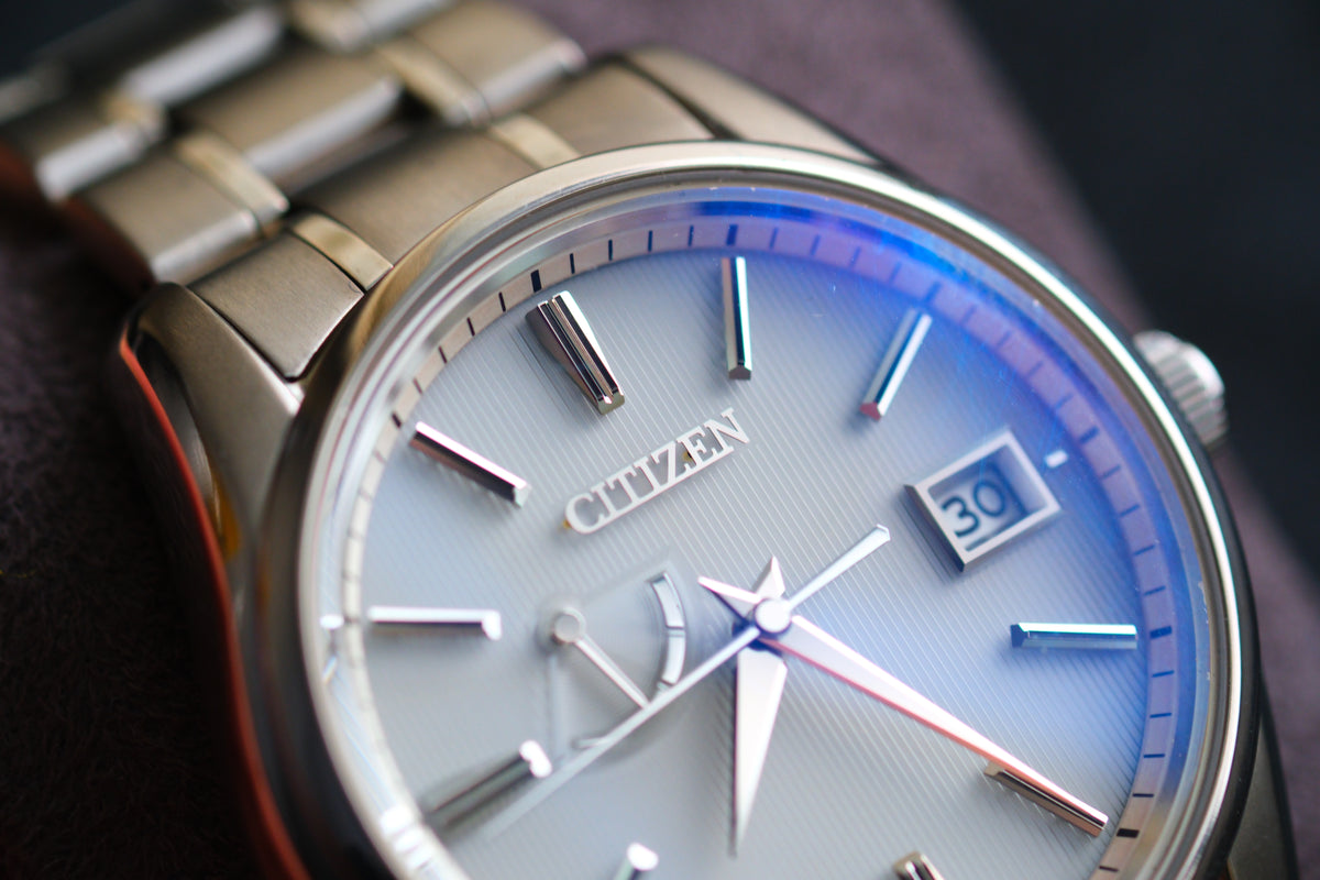 The Citizen Chronomaster AQ1020-51A Titanium Eco Drive Brushed-stripe White dial Box Manual User Excellent Condition