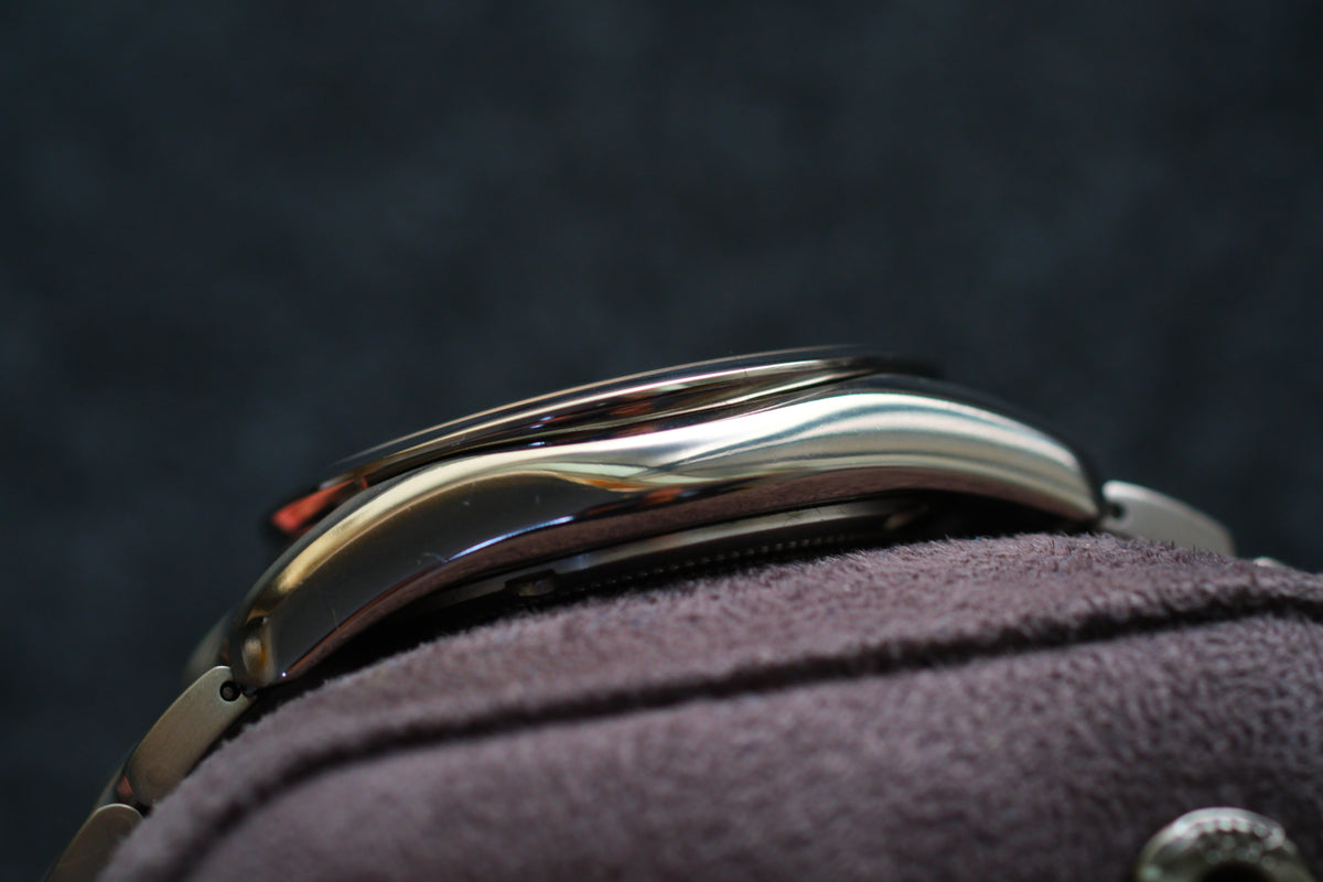 The Citizen Chronomaster AQ1020-51A Titanium Eco Drive Brushed-stripe White dial Box Manual User Excellent Condition