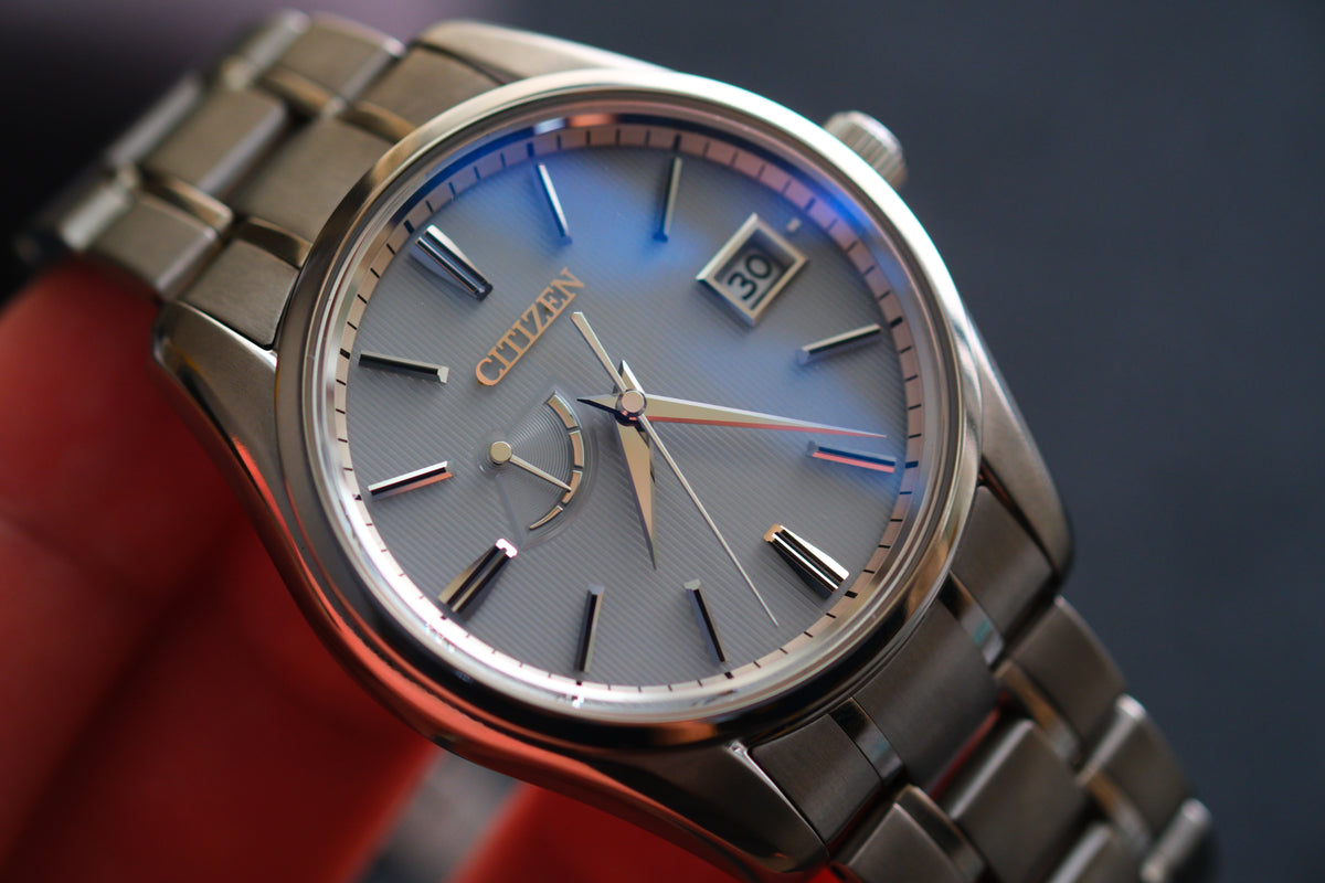 The Citizen Chronomaster AQ1020-51A Titanium Eco Drive Brushed-stripe White dial Box Manual User Excellent Condition
