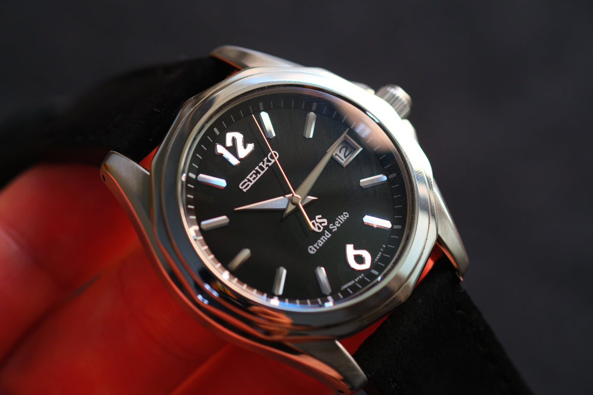 Grand Seiko SBGX035 9F62-0A60 HAQ 12-Sided Bezel Black Woven Dial Great Condition
