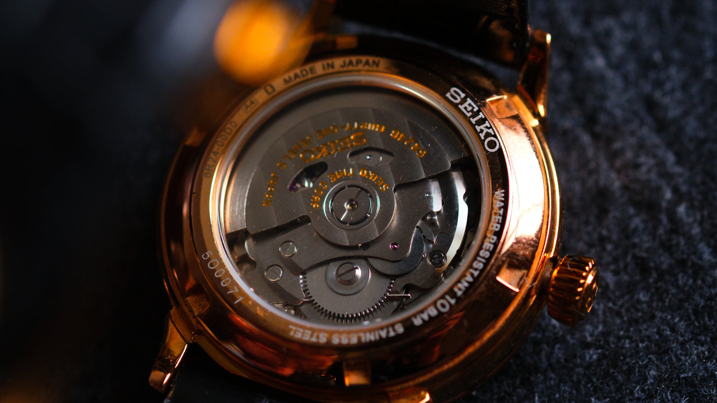 Seiko SARD006 Pressage 6R24-00D0 Rose Gold JDM Rare Retrograde day-date Power Reserve and a white dial | Great Condition