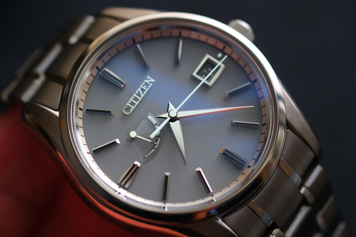 The Citizen Chronomaster AQ1020-51A Titanium Eco Drive Brushed-stripe White dial Box Manual User Excellent Condition