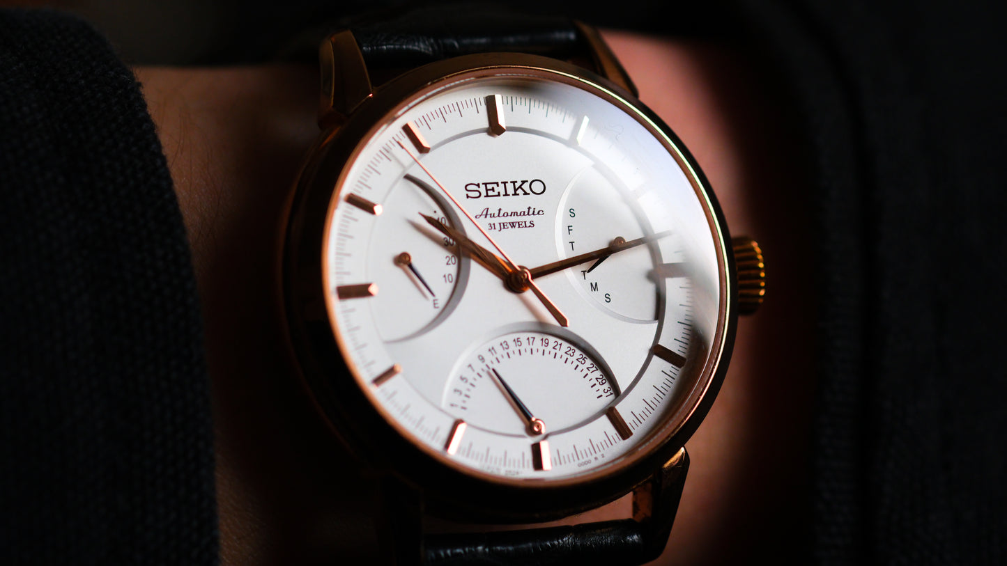 Seiko SARD006 Pressage 6R24-00D0 Rose Gold JDM Rare Retrograde day-date Power Reserve and a white dial | Great Condition