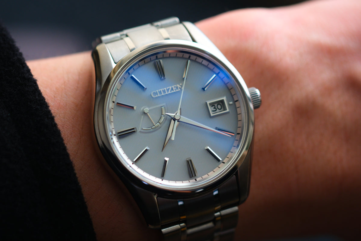 The Citizen Chronomaster AQ1020-51A Titanium Eco Drive Brushed-stripe White dial Box Manual User Excellent Condition