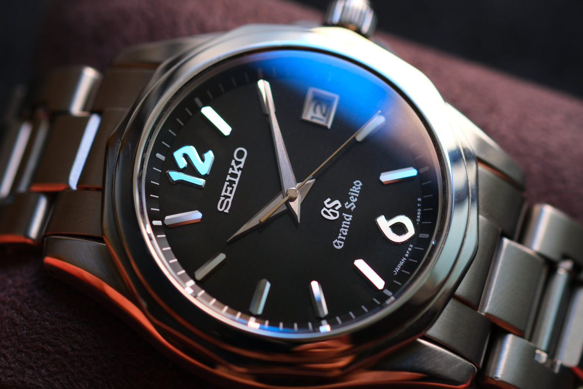 Grand Seiko SBGX035 9F62-0A60 HAQ 12-Sided Bezel Black Woven Dial Great Condition