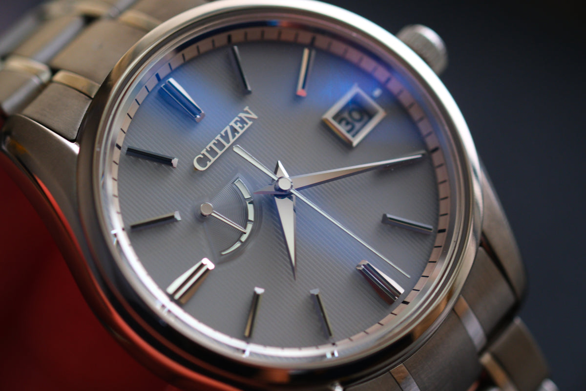 The Citizen Chronomaster AQ1020-51A Titanium Eco Drive Brushed-stripe White dial Box Manual User Excellent Condition
