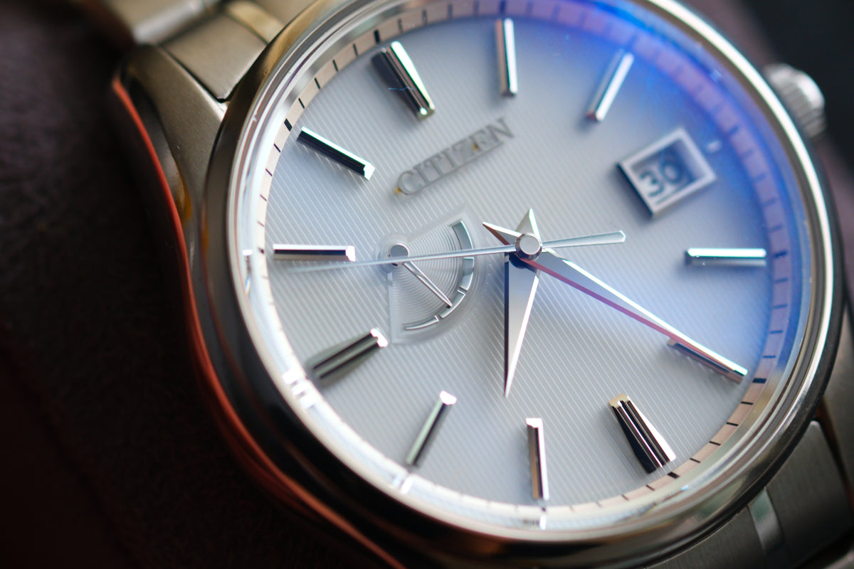 The Citizen Chronomaster AQ1020-51A Titanium Eco Drive Brushed-stripe White dial Box Manual User Excellent Condition