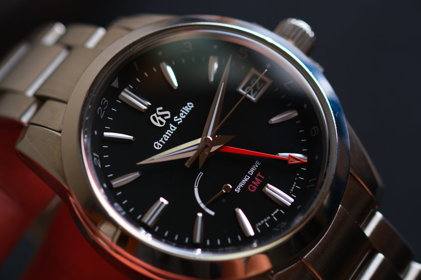 Grand Seiko SBGE213 9R66-0AE0 Spring Drive GMT Red Hands Black Dial Box Manual User Hang Tag Good Condition
