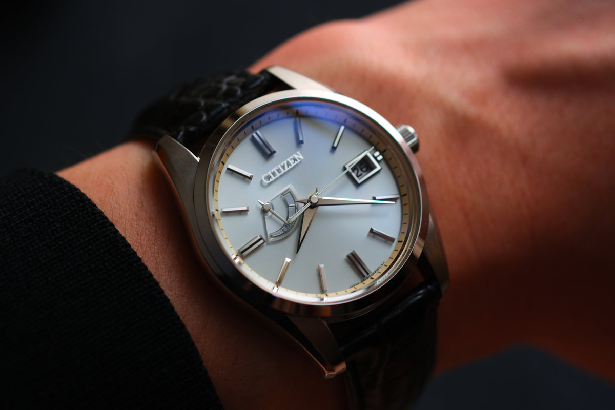 The Citizen AQ1010-03A A010-T018530 Eco Drive Full Box Paper White Ice Blue Dial