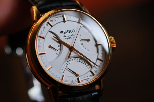 Seiko SARD006 Pressage 6R24-00D0 Rose Gold JDM Rare Retrograde day-date Power Reserve and a white dial | Great Condition