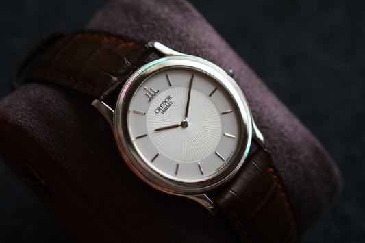 Credor 5A74-2010 JDM Ultra-Slim Dress Watch White Two tone Dial Vintage Style 18KWG Bezel Good Condition