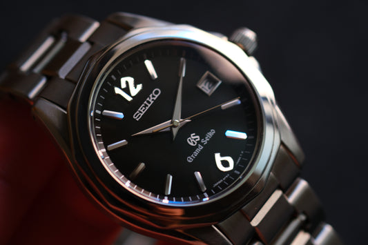 Grand Seiko SBGX035 9F62-0A60 HAQ 12-Sided Bezel Black Woven Dial Great Condition