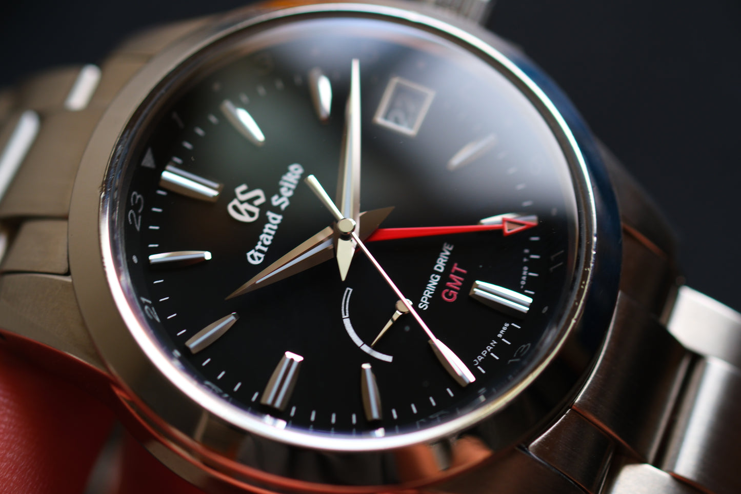 Grand Seiko SBGE213 9R66-0AE0 Spring Drive GMT Red Hands Black Dial Box Manual User Hang Tag Good Condition